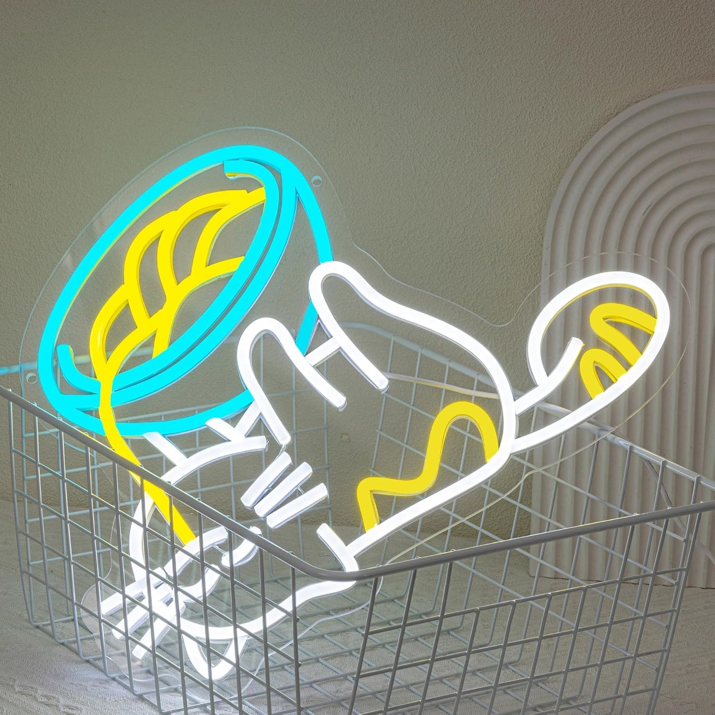 LED neon sign with cat lying under noodles bowl