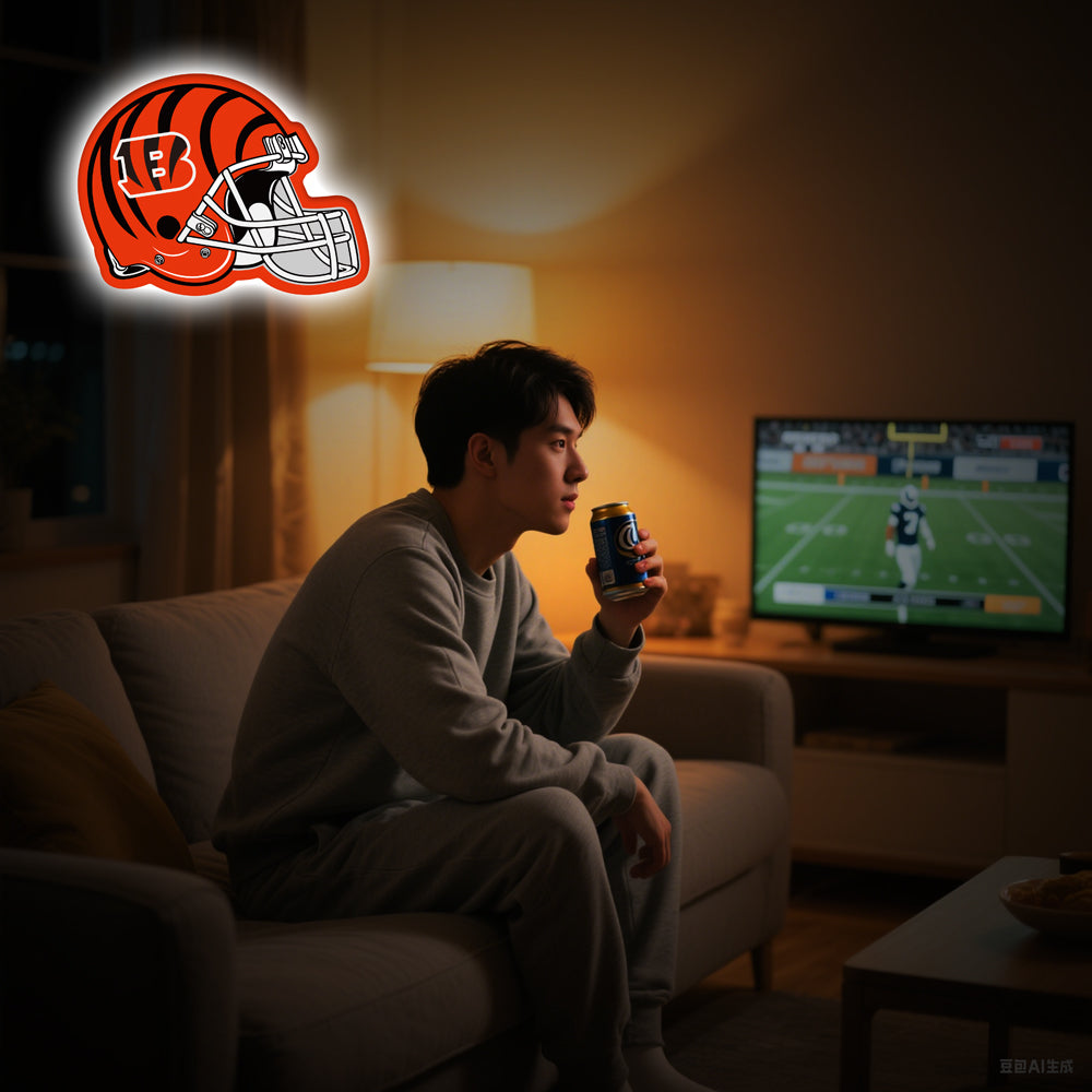 Cincinnati Bengals football helmet-shaped LED neon sign in orange and black, perfect for NFL fans, sports bar decor, and game room lighting.