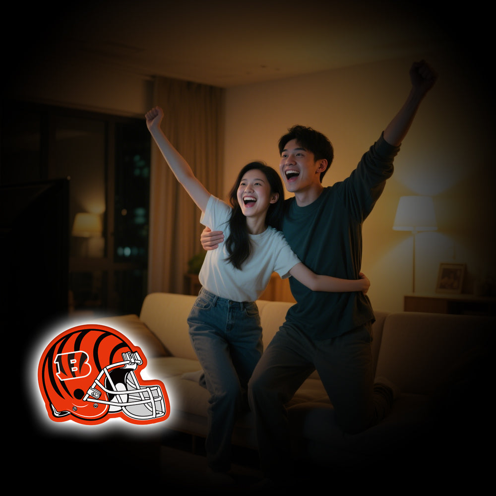 Cincinnati Bengals football helmet-shaped LED neon sign in orange and black, perfect for NFL fans, sports bar decor, and game room lighting.