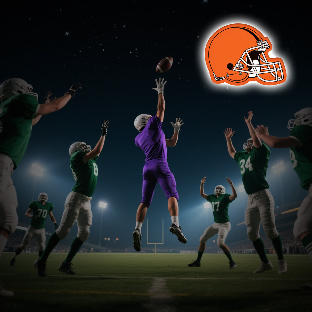 LED neon sign shaped like a Cleveland Browns football helmet in bright orange, perfect for NFL fans, sports bar walls, and football-themed rooms.