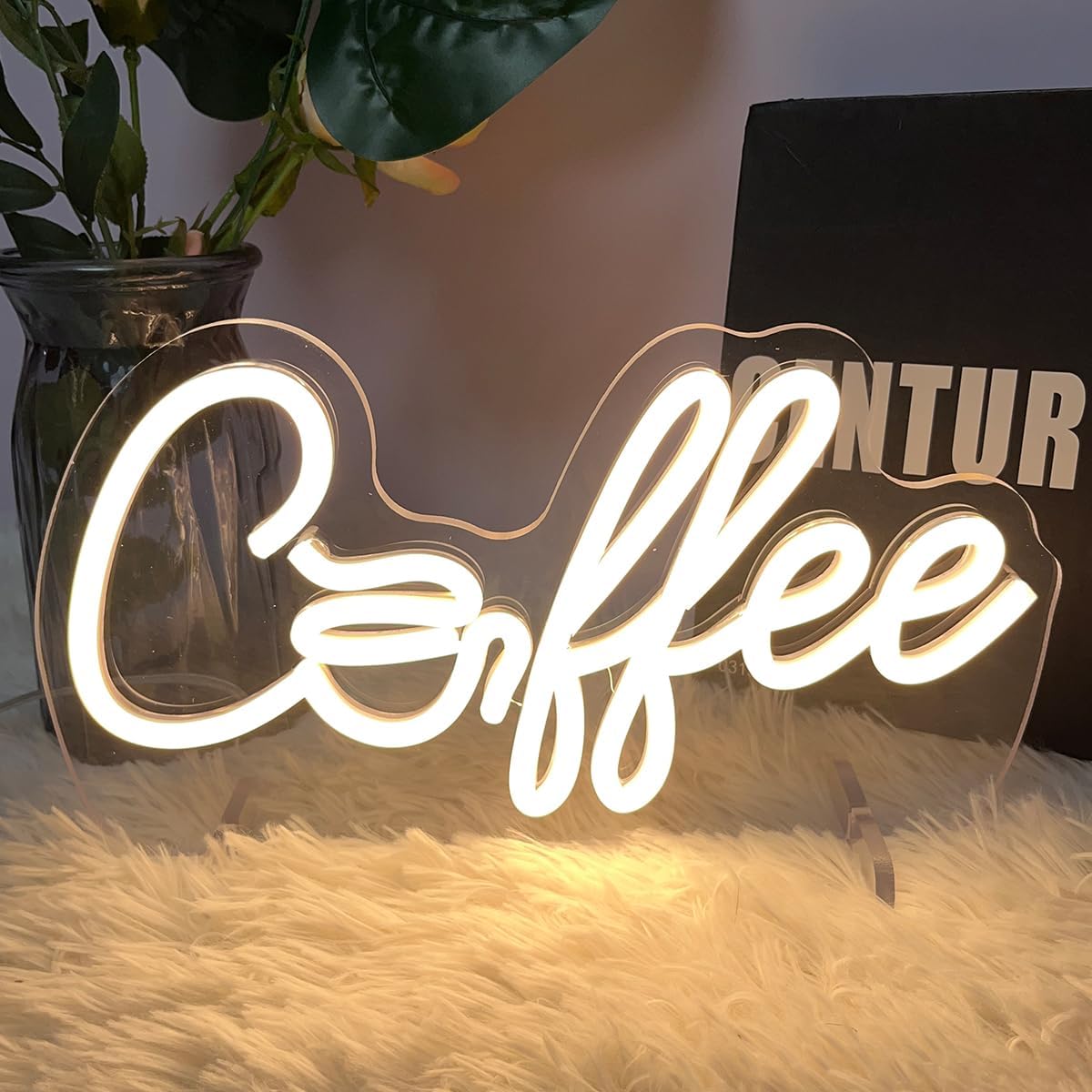 Glowing LED neon sign with the word "coffee", perfect for café, coffee bar, or kitchen wall decor.