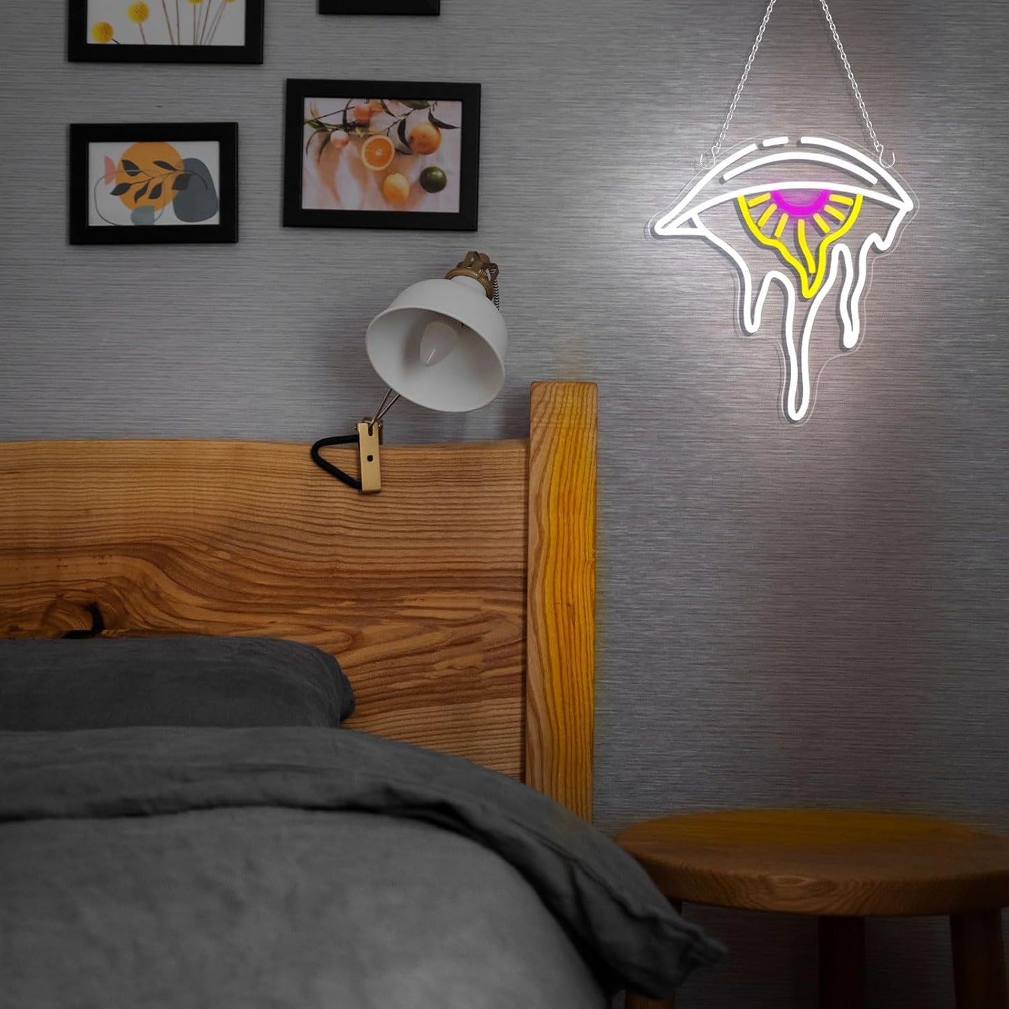 LED neon sign shaped like a crying eye with teardrop, glowing softly on a wall, perfect for moody and expressive interior design