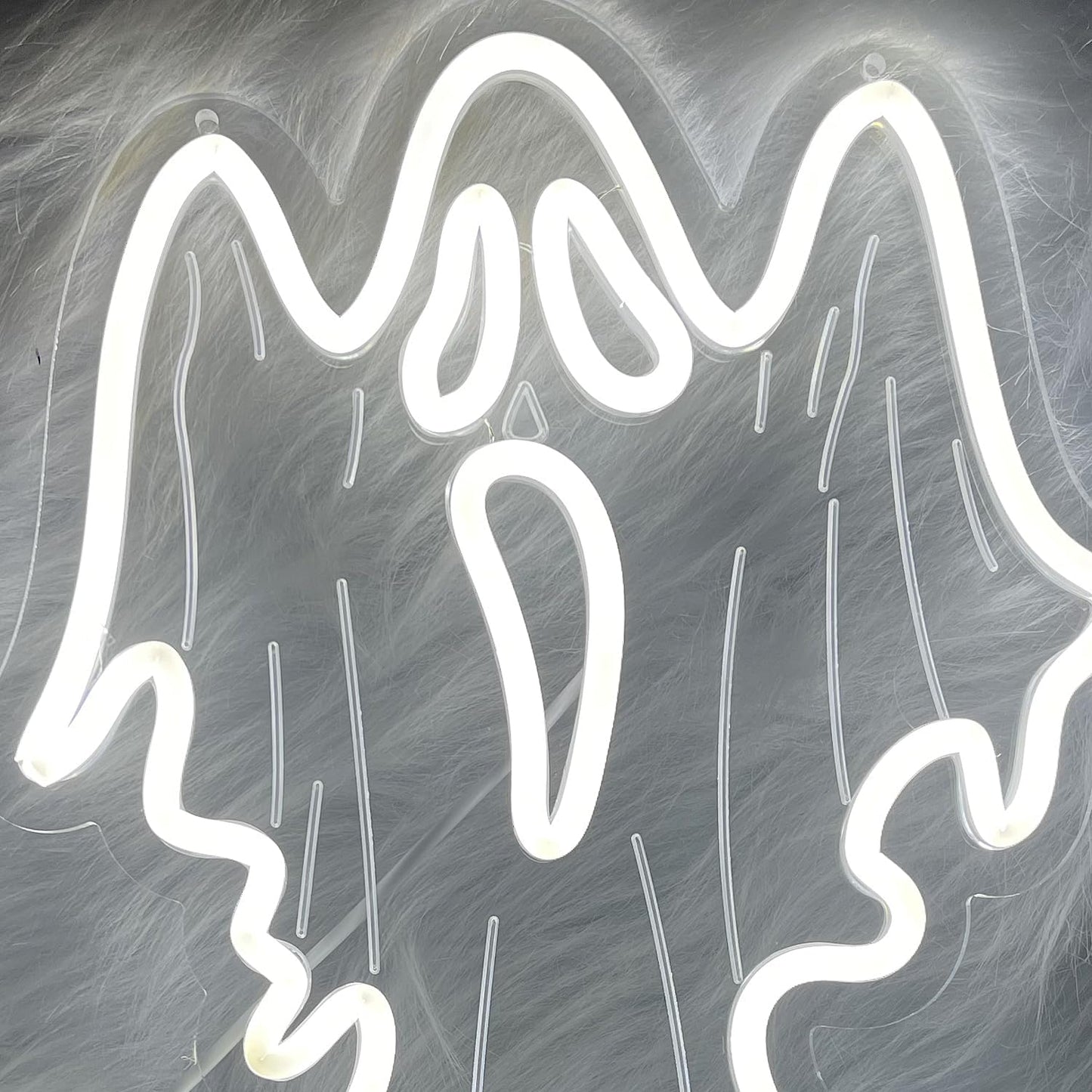 White ghost-shaped neon LED sign on acrylic backing, Halloween and spooky-themed home decor