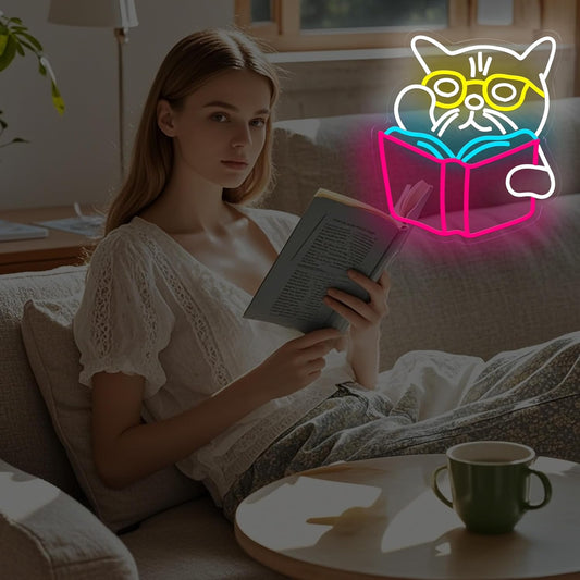 Cat wearing glasses reading a book neon sign