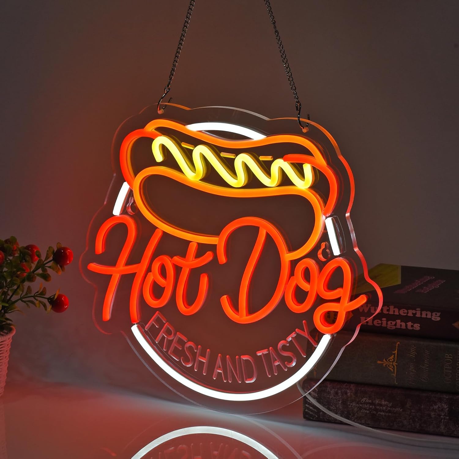 Hot dog neon sign with text “Fresh and Tasty” in red, yellow, and white LED lighting