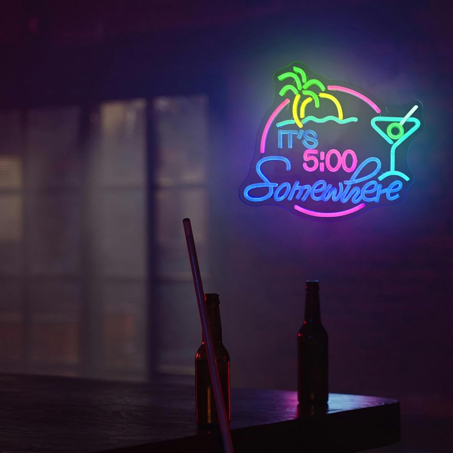 "It’s 5:00 Somewhere" neon sign with cocktail and palm tree
