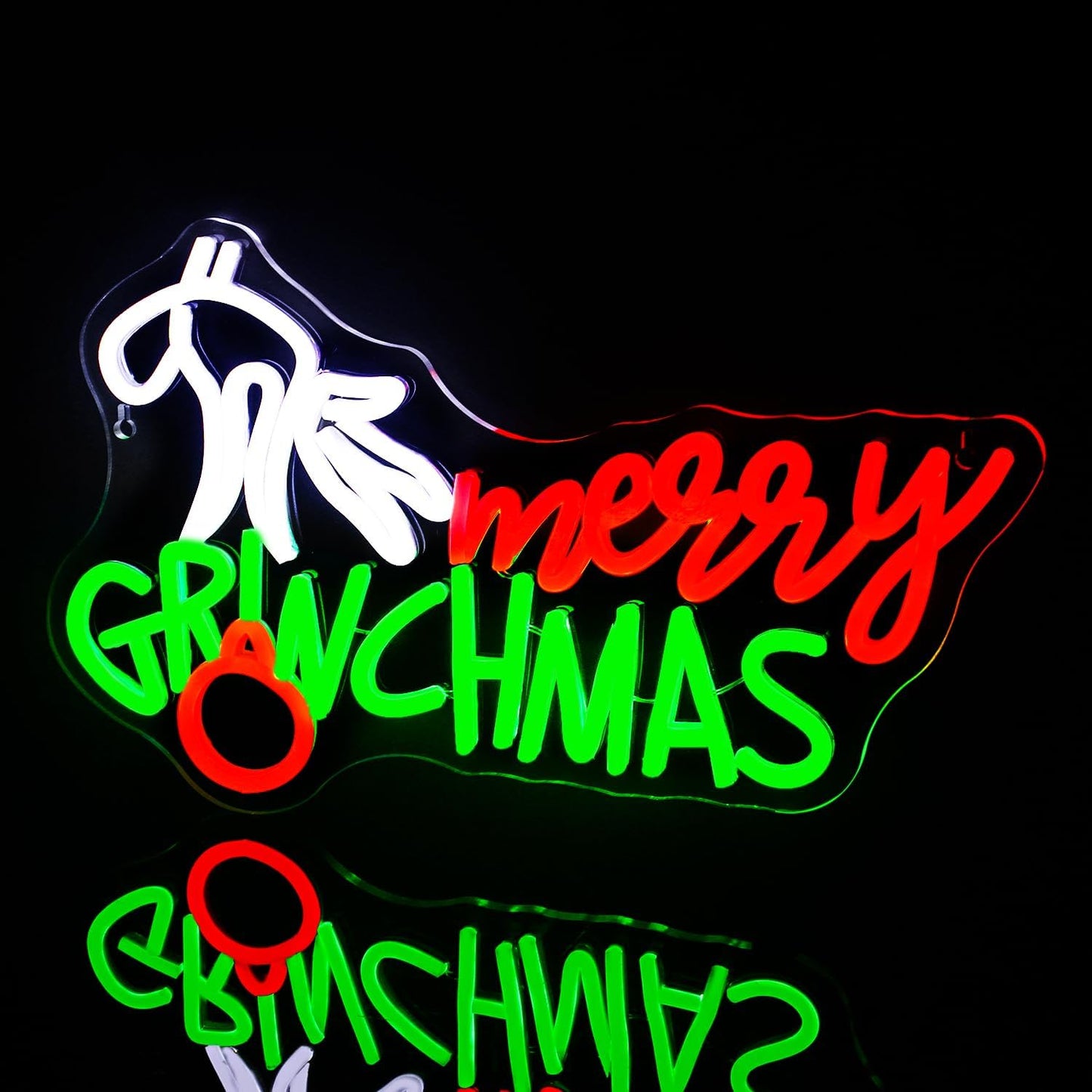 Merry Grinchmas neon sign with a hand holding ornament in red, green, and white LED lights for holiday decor