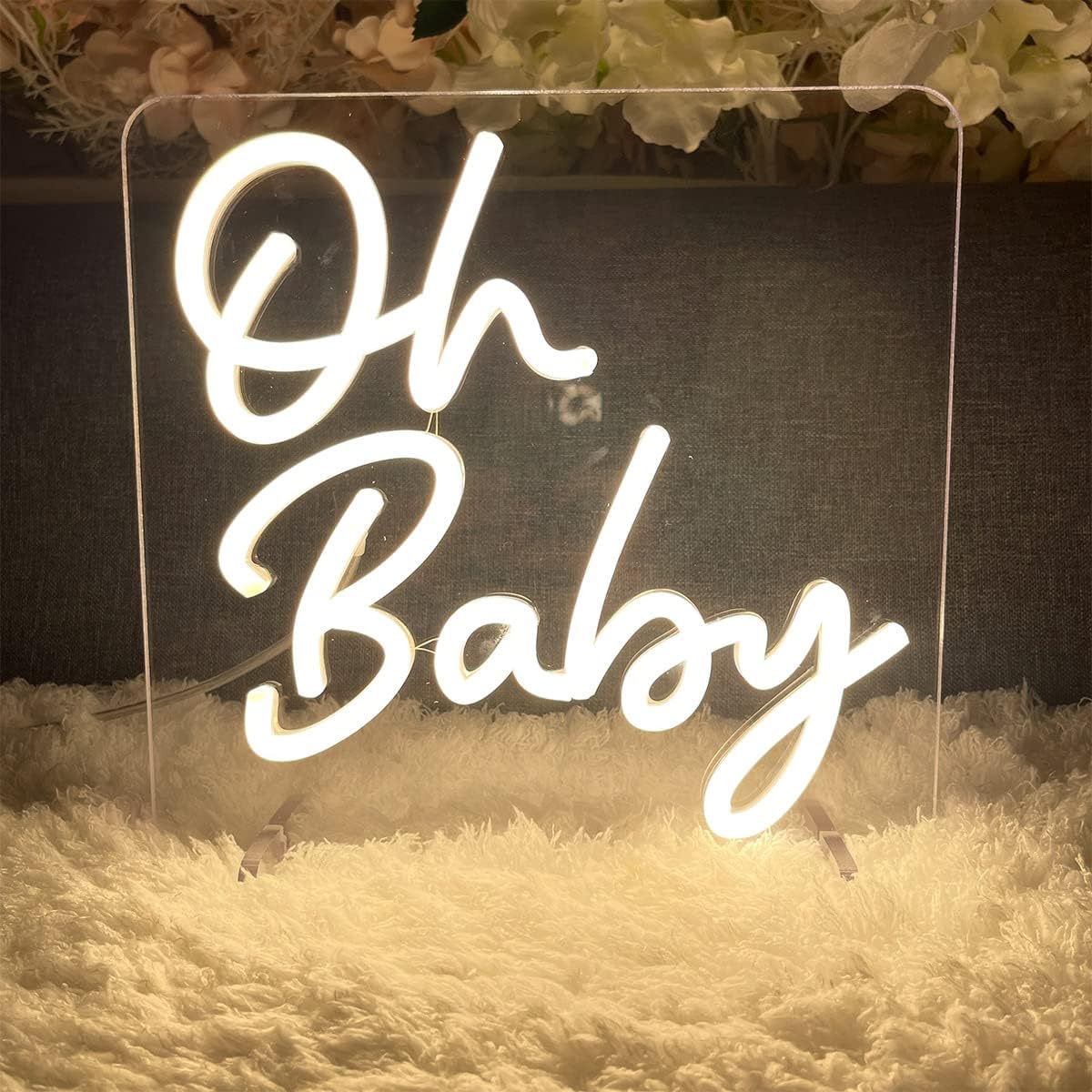 LED neon sign displaying the words "Oh Baby" in warm white light, perfect for baby showers and nurseries