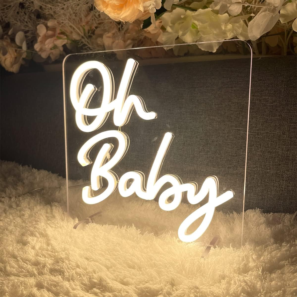 LED neon sign displaying the words "Oh Baby" in warm white light, perfect for baby showers and nurseries