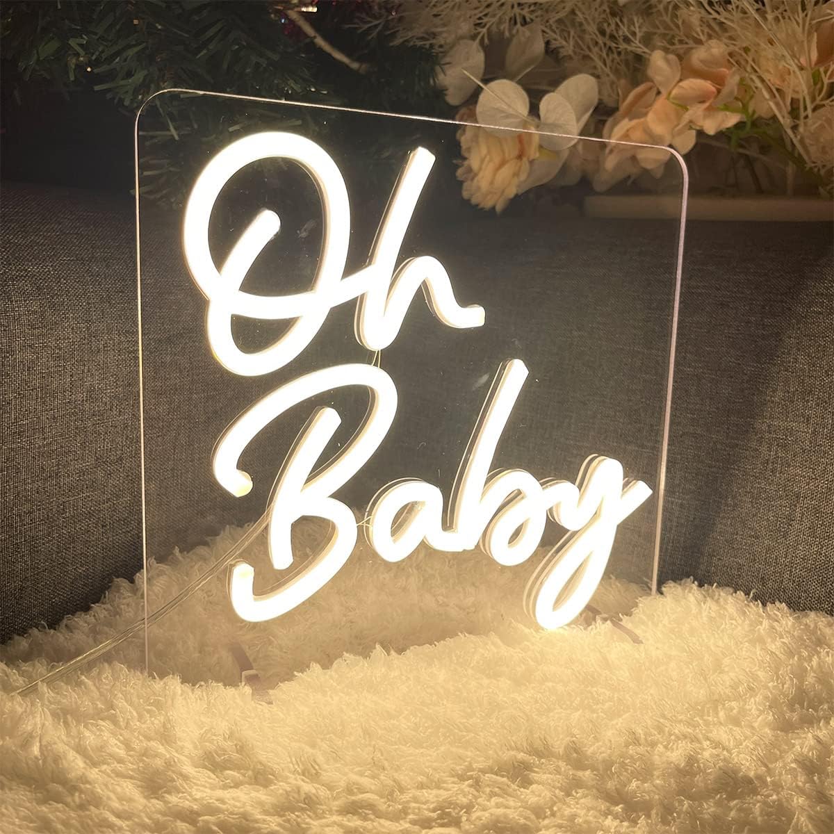 LED neon sign displaying the words "Oh Baby" in warm white light, perfect for baby showers and nurseries