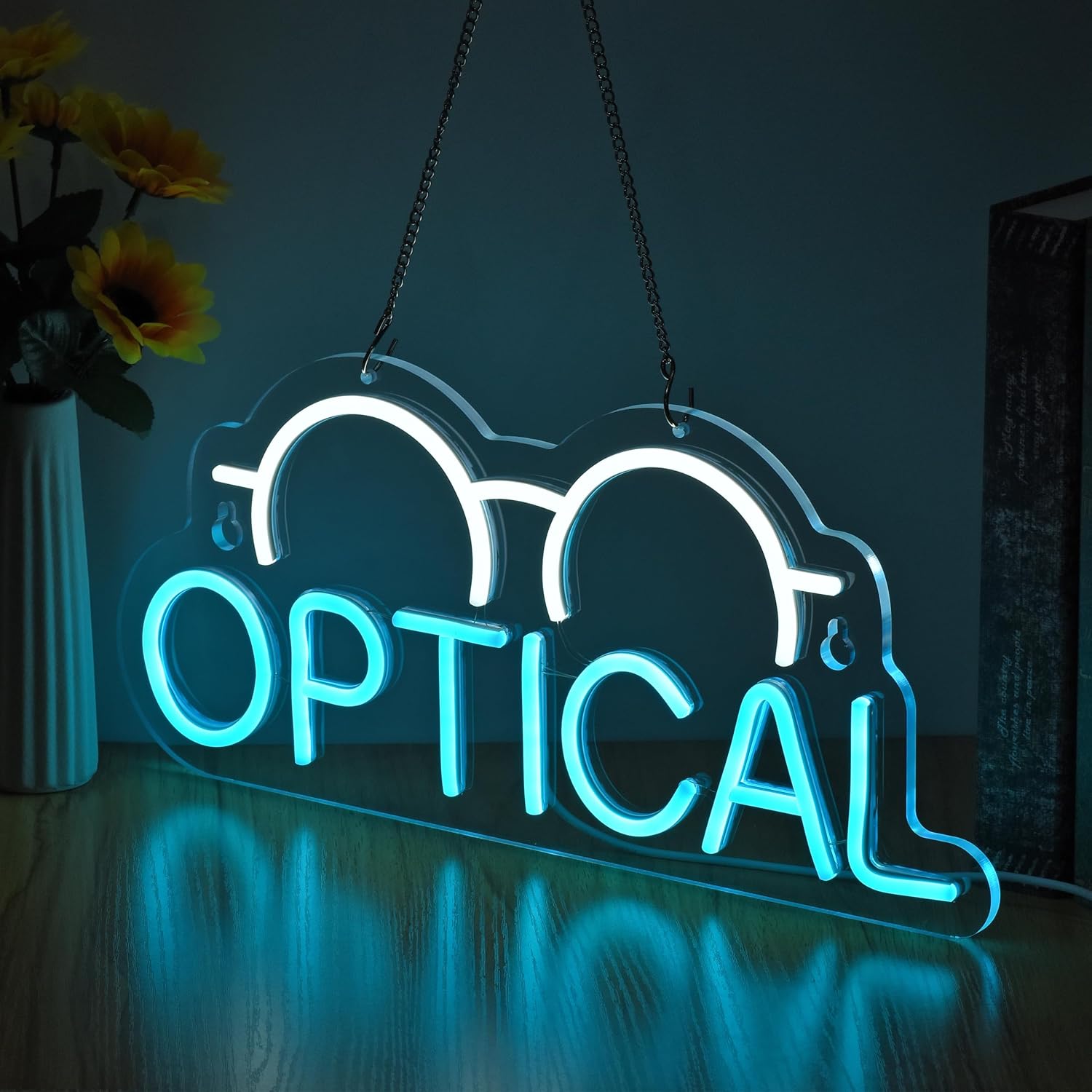 Neon sign with eyeglasses icon and OPTICAL text for eyewear store decor