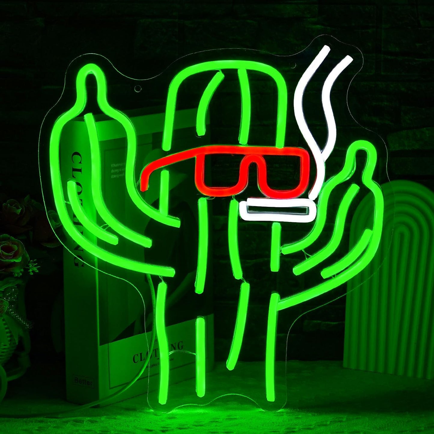 Rebellious cactus neon sign with sunglasses, cigarette, and middle fingers