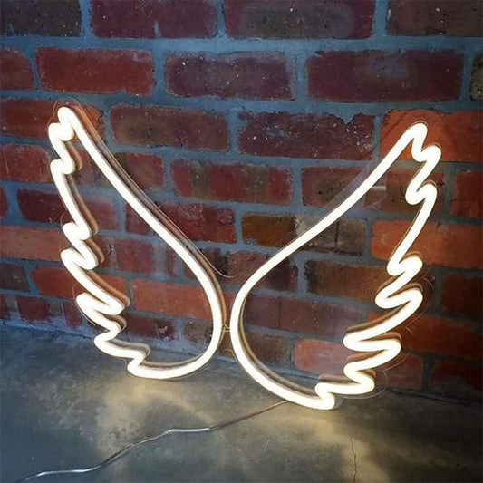 Glowing angel wings neon sign wall light – perfect for bedroom or studio decor

