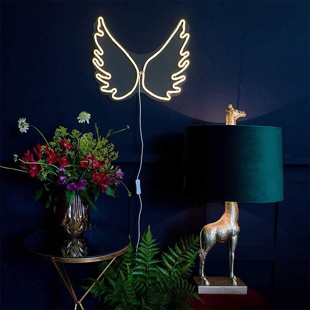 Glowing angel wings neon sign wall light – perfect for bedroom or studio decor

