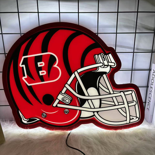 Cincinnati Bengals football helmet-shaped LED neon sign in orange and black, perfect for NFL fans, sports bar decor, and game room lighting.