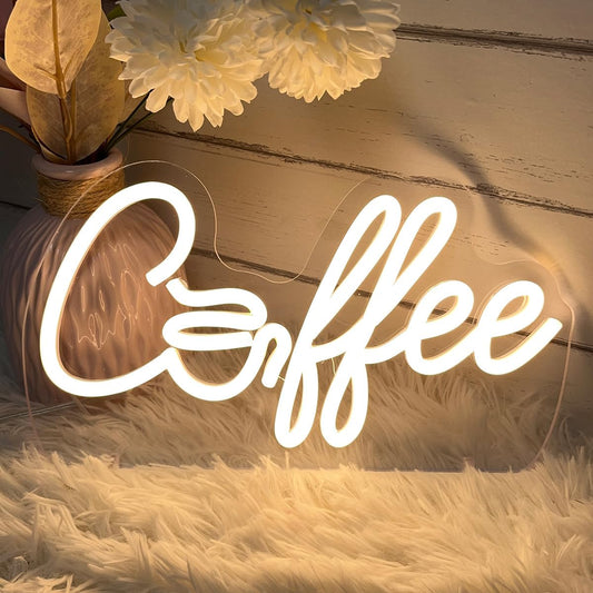Glowing LED neon sign with the word "coffee", perfect for café, coffee bar, or kitchen wall decor.