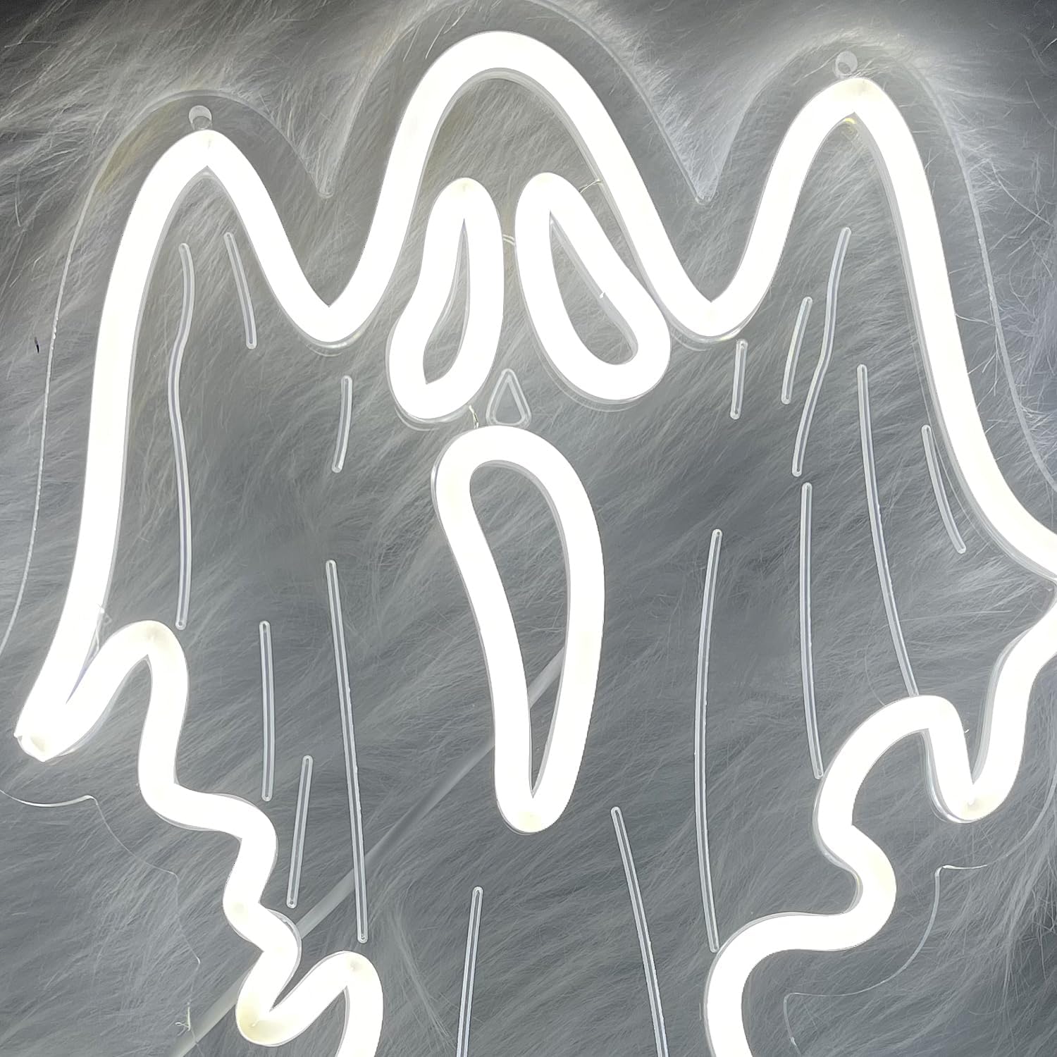 White ghost-shaped neon LED sign on acrylic backing, Halloween and spooky-themed home decor