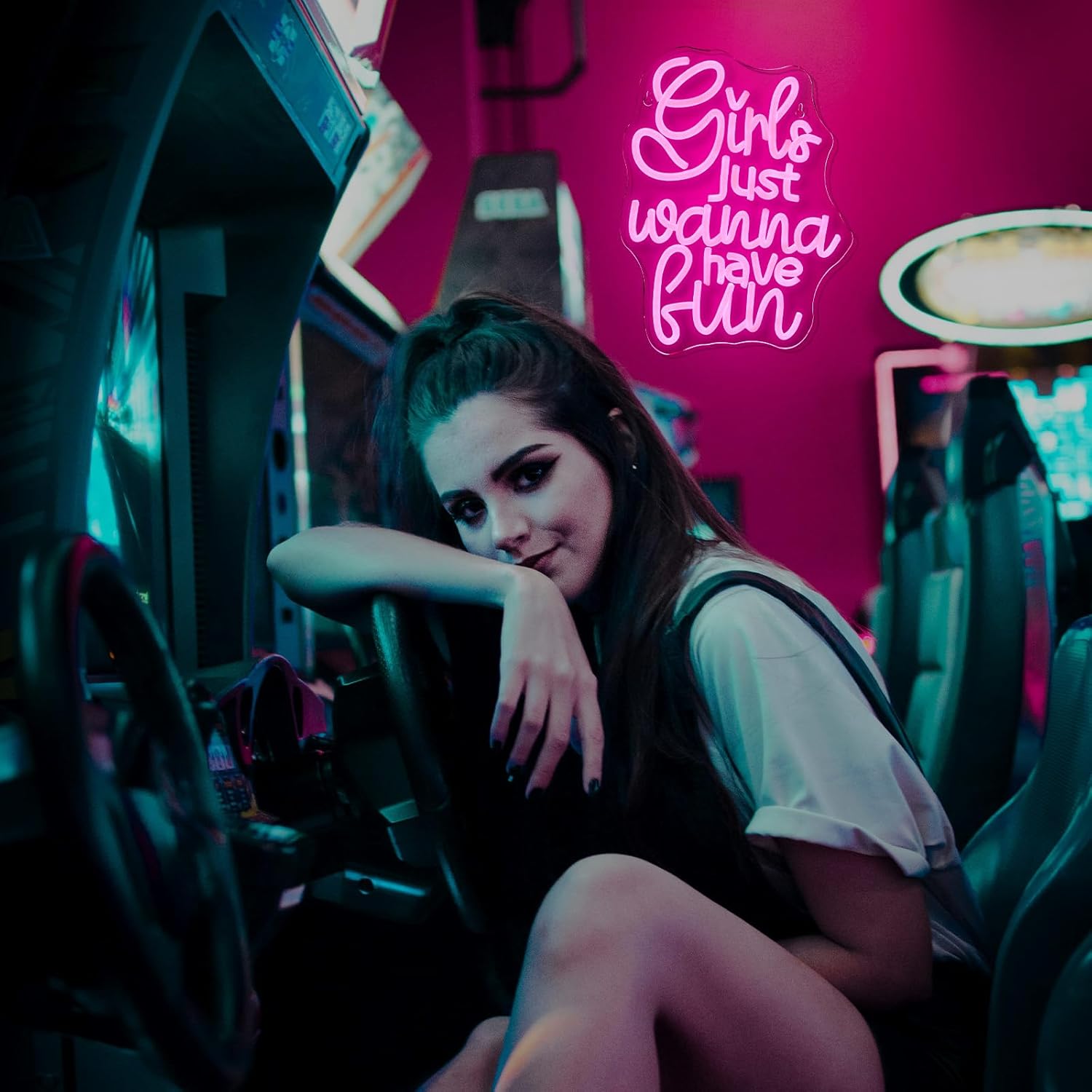 Bright neon sign spelling "Girls Just Wanna Have Fun" in LED, perfect for party rooms or bachelorette decor