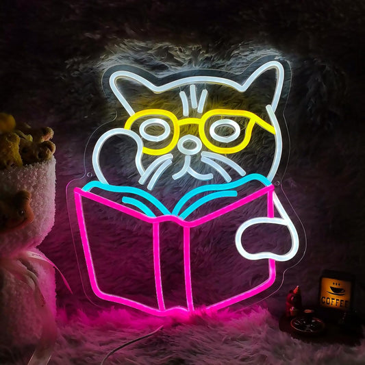 Cat wearing glasses reading a book neon sign
