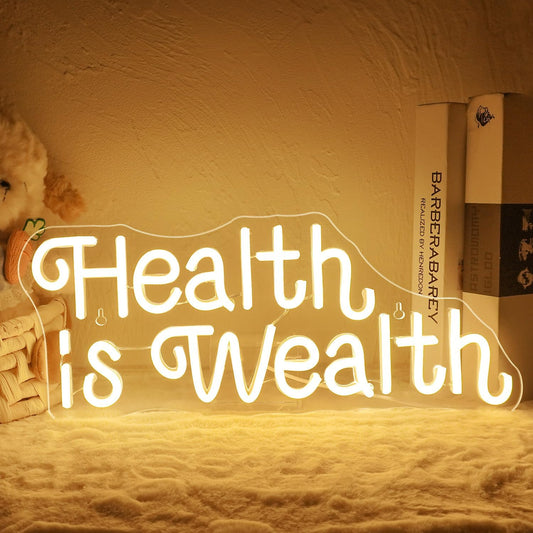 Health is Wealth neon sign glowing in LED light, motivational wall decor for gym or wellness space