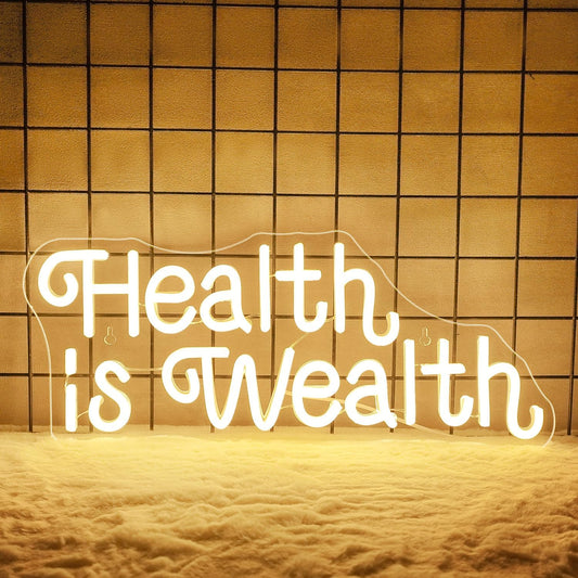 Health is Wealth neon sign glowing in LED light, motivational wall decor for gym or wellness space
