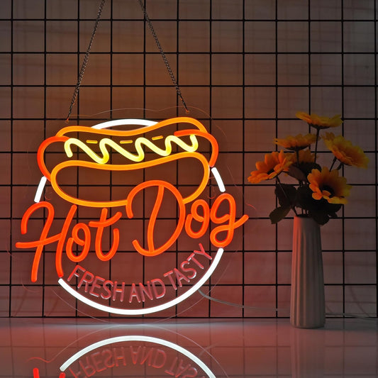 Hot dog neon sign with text “Fresh and Tasty” in red, yellow, and white LED lighting

