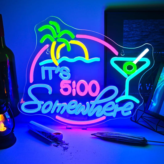"It’s 5:00 Somewhere" neon sign with cocktail and palm tree