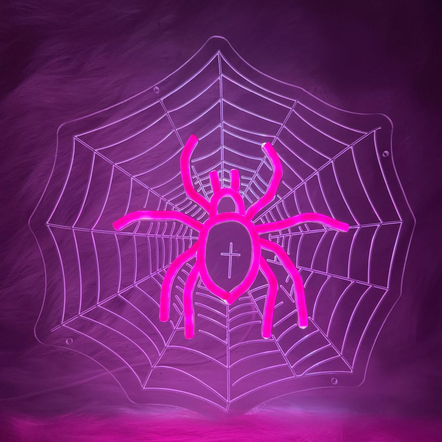 Neon sign of a spider sitting in the center of a spiderweb with UV-printed detail, gothic and Halloween-themed room decor