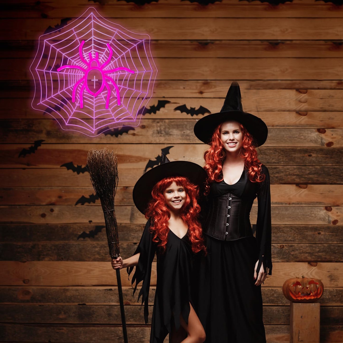 Neon sign of a spider sitting in the center of a spiderweb with UV-printed detail, gothic and Halloween-themed room decor