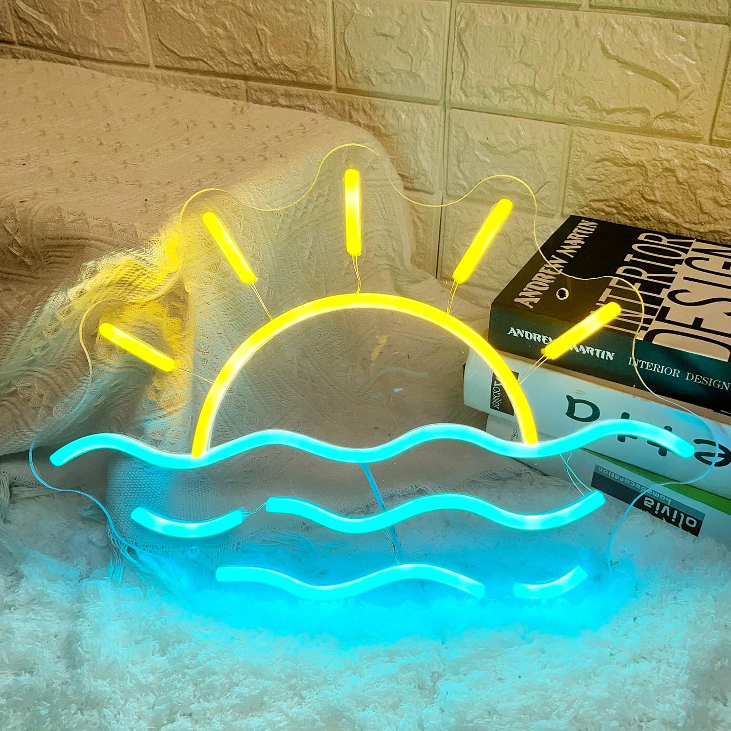 LED neon sign of a sunrise or sunset over the ocean, glowing wall decor