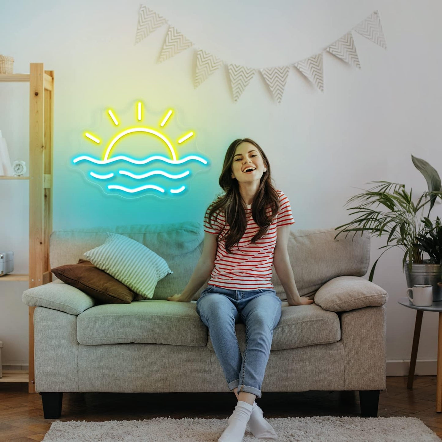 LED neon sign of a sunrise or sunset over the ocean, glowing wall decor