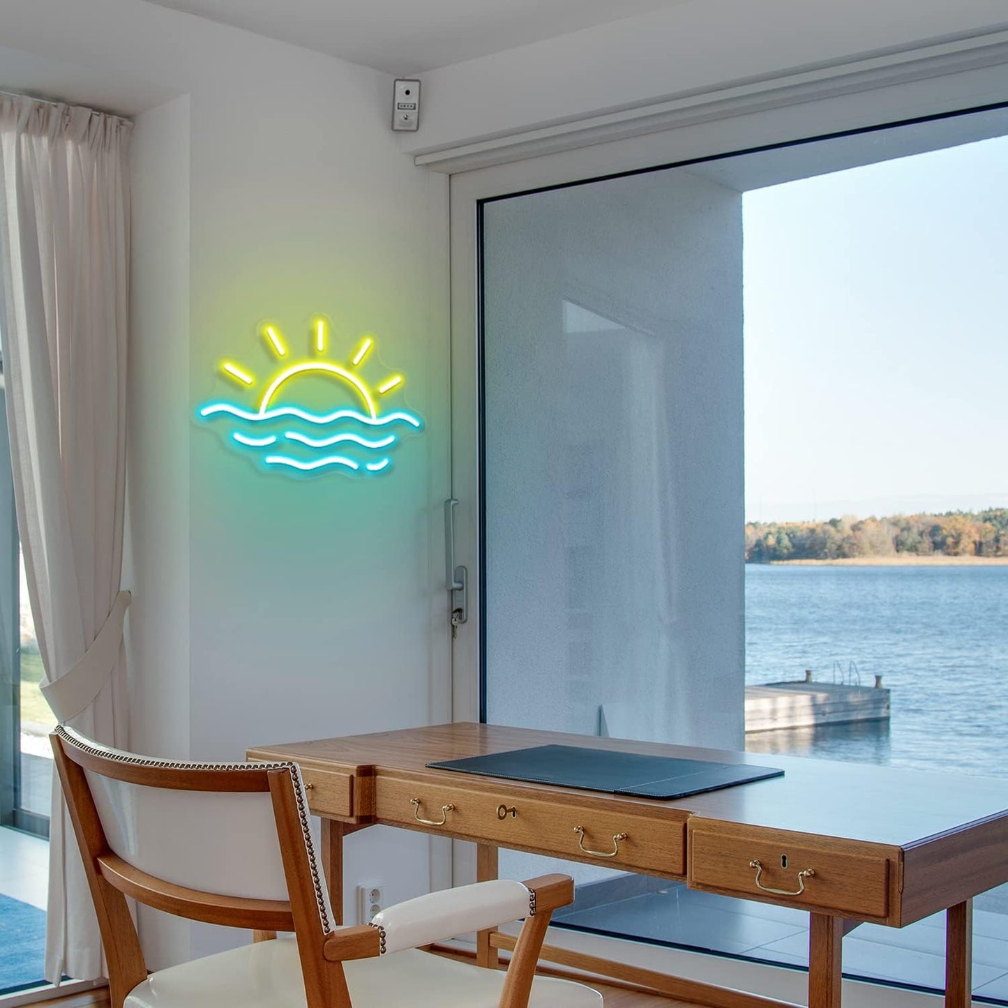 LED neon sign of a sunrise or sunset over the ocean, glowing wall decor