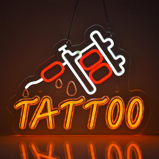 LED tattoo neon sign in red and orange featuring a tattoo machine and dripping ink
