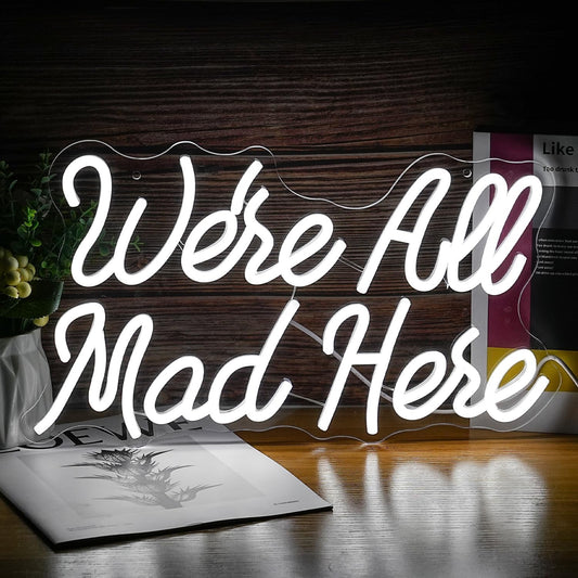 White LED neon sign with ‘We’re All Mad Here’ text – fun wall decor inspired by Alice in Wonderland