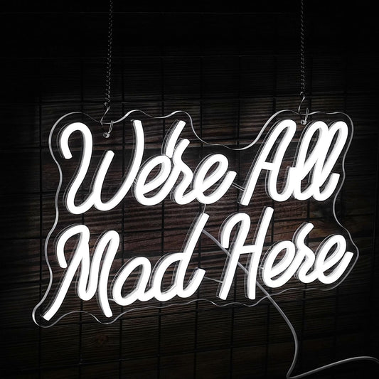 White LED neon sign with ‘We’re All Mad Here’ text – fun wall decor inspired by Alice in Wonderland